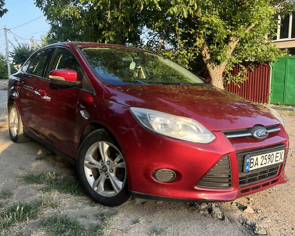 Красный Форд Фокус, объемом двигателя 2 л и пробегом 151 тыс. км за 7500 $, фото 1 на Automoto.ua