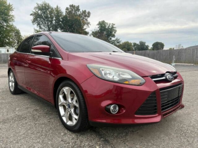 Красный Форд Фокус, объемом двигателя 2 л и пробегом 80 тыс. км за 3600 $, фото 1 на Automoto.ua