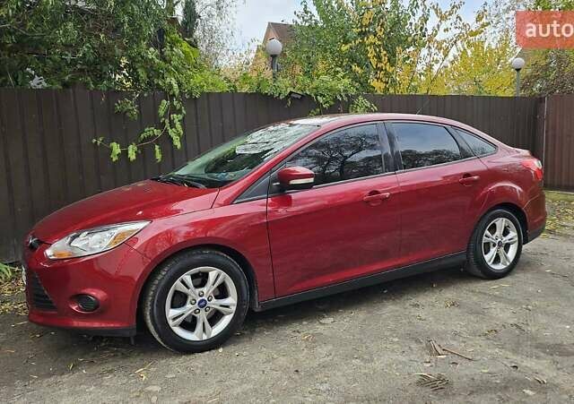 Червоний Форд Фокус, об'ємом двигуна 2 л та пробігом 130 тис. км за 7200 $, фото 1 на Automoto.ua