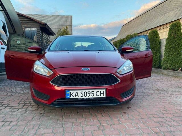 Червоний Форд Фокус, об'ємом двигуна 2 л та пробігом 170 тис. км за 7185 $, фото 1 на Automoto.ua