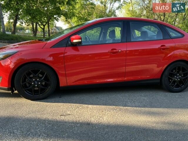 Красный Форд Фокус, объемом двигателя 2 л и пробегом 131 тыс. км за 9500 $, фото 1 на Automoto.ua