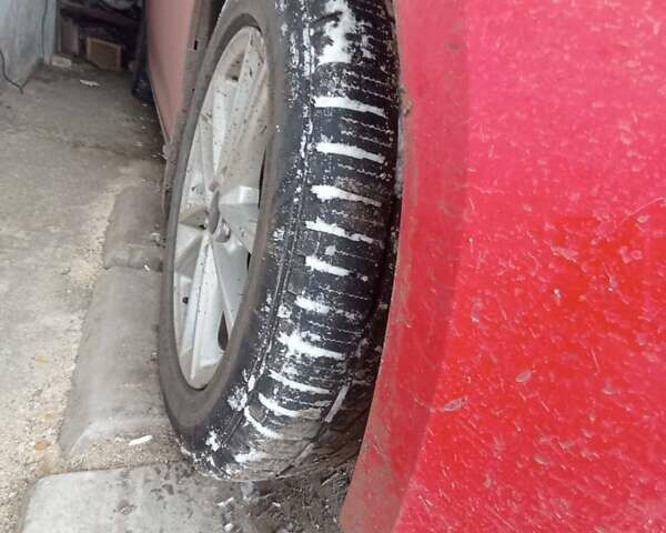 Червоний Форд Фокус, об'ємом двигуна 2 л та пробігом 110 тис. км за 8800 $, фото 1 на Automoto.ua