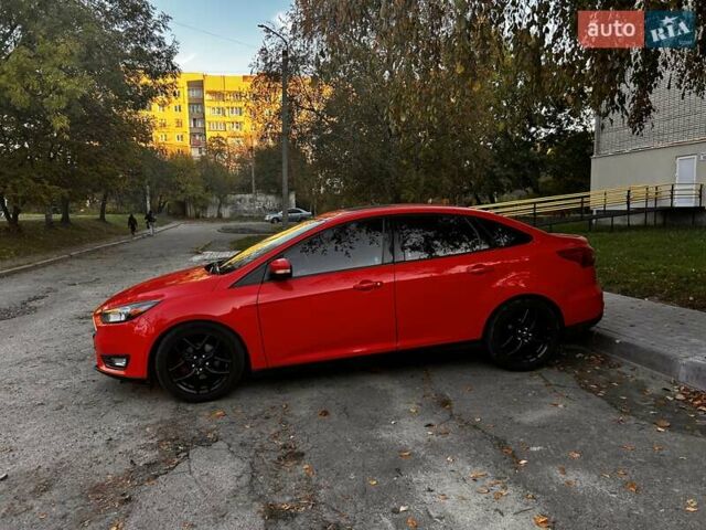 Красный Форд Фокус, объемом двигателя 2 л и пробегом 181 тыс. км за 10000 $, фото 1 на Automoto.ua