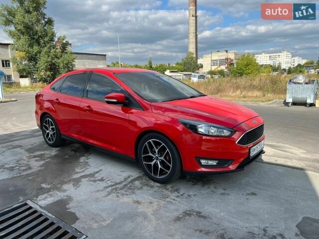 Червоний Форд Фокус, об'ємом двигуна 2 л та пробігом 150 тис. км за 9300 $, фото 1 на Automoto.ua