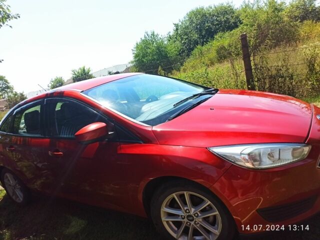 Червоний Форд Фокус, об'ємом двигуна 2 л та пробігом 148 тис. км за 9800 $, фото 1 на Automoto.ua
