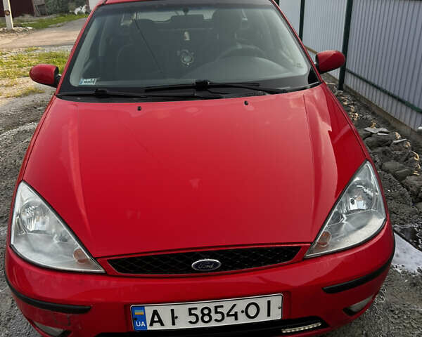 Красный Форд Фокус, объемом двигателя 1.8 л и пробегом 218 тыс. км за 4000 $, фото 1 на Automoto.ua