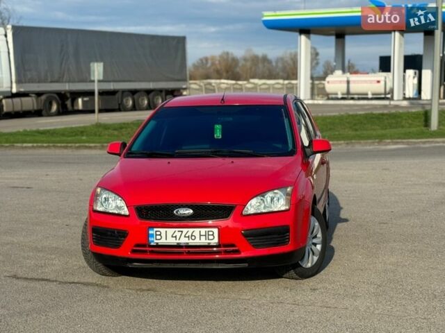 Красный Форд Фокус, объемом двигателя 1.56 л и пробегом 248 тыс. км за 5100 $, фото 1 на Automoto.ua