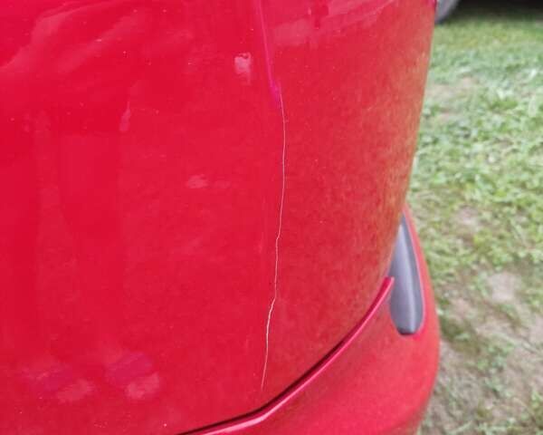 Красный Форд Фокус, объемом двигателя 1.8 л и пробегом 330 тыс. км за 4600 $, фото 1 на Automoto.ua