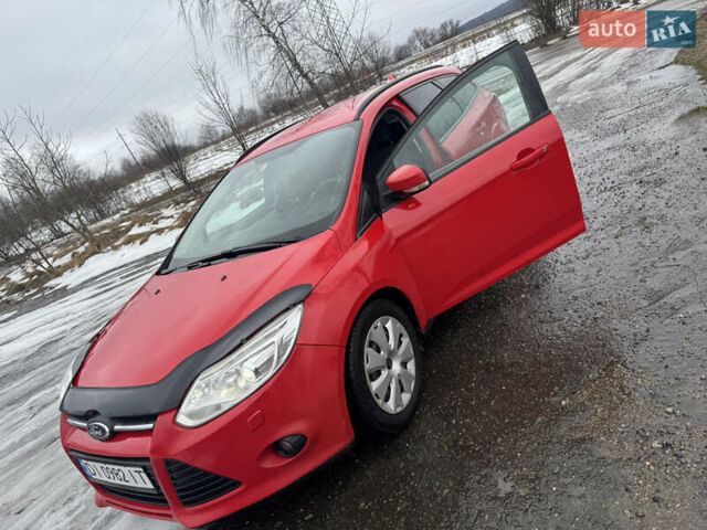 Червоний Форд Фокус, об'ємом двигуна 2 л та пробігом 296 тис. км за 7500 $, фото 1 на Automoto.ua