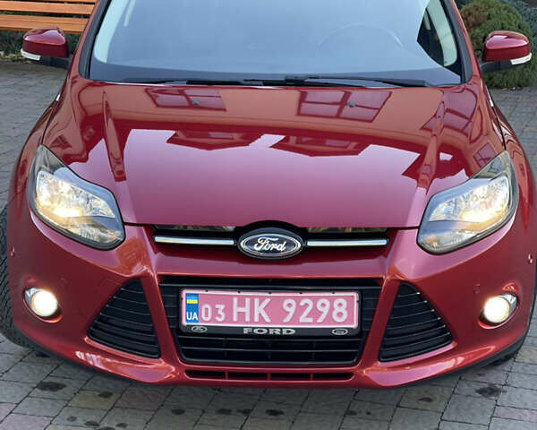 Красный Форд Фокус, объемом двигателя 2 л и пробегом 229 тыс. км за 9850 $, фото 1 на Automoto.ua
