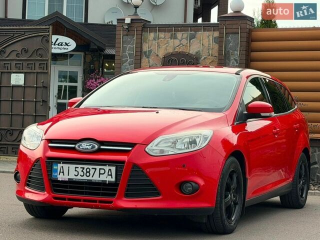Червоний Форд Фокус, об'ємом двигуна 1 л та пробігом 188 тис. км за 5600 $, фото 1 на Automoto.ua