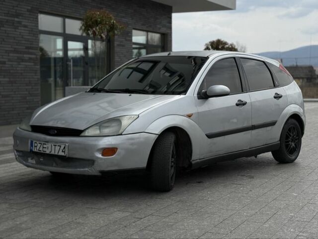 Серый Форд Фокус, объемом двигателя 1.8 л и пробегом 298 тыс. км за 1200 $, фото 1 на Automoto.ua