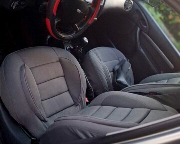 Серый Форд Фокус, объемом двигателя 1.8 л и пробегом 340 тыс. км за 2800 $, фото 1 на Automoto.ua