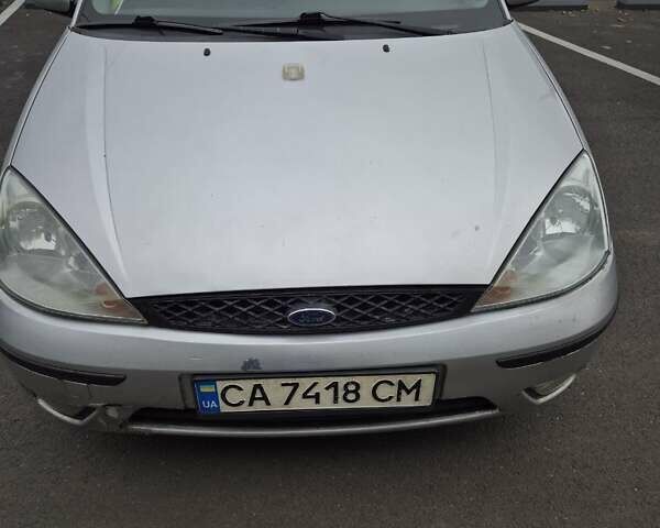 Серый Форд Фокус, объемом двигателя 1.8 л и пробегом 180 тыс. км за 3000 $, фото 1 на Automoto.ua