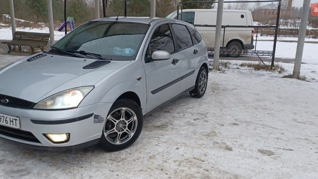 Серый Форд Фокус, объемом двигателя 1.8 л и пробегом 350 тыс. км за 3850 $, фото 1 на Automoto.ua