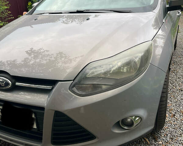 Серый Форд Фокус, объемом двигателя 1.6 л и пробегом 270 тыс. км за 5650 $, фото 1 на Automoto.ua