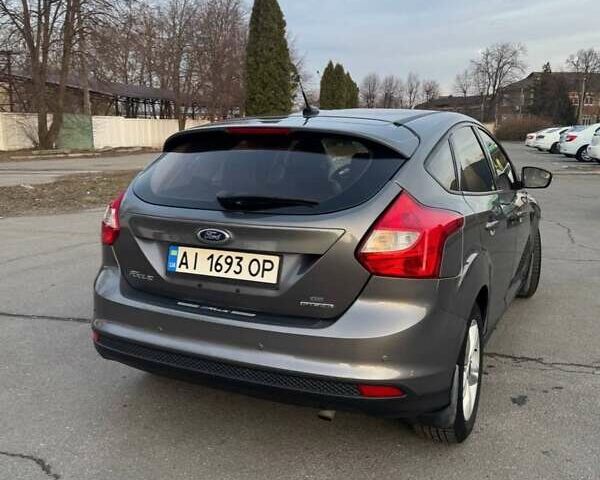 Сірий Форд Фокус, об'ємом двигуна 2 л та пробігом 91 тис. км за 7400 $, фото 1 на Automoto.ua