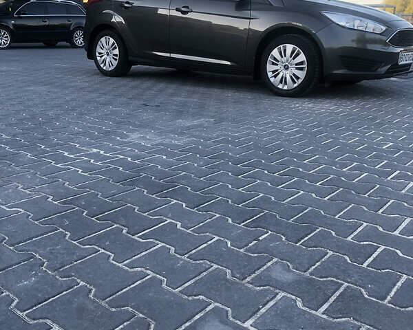 Серый Форд Фокус, объемом двигателя 1.5 л и пробегом 253 тыс. км за 9750 $, фото 1 на Automoto.ua