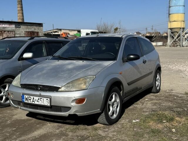 Серый Форд Фокус, объемом двигателя 1.8 л и пробегом 300 тыс. км за 750 $, фото 1 на Automoto.ua