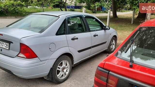 Серый Форд Фокус, объемом двигателя 1.6 л и пробегом 300 тыс. км за 2200 $, фото 1 на Automoto.ua