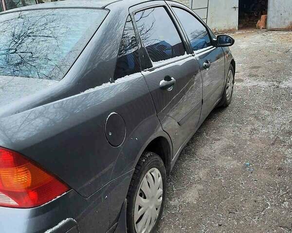 Серый Форд Фокус, объемом двигателя 1.6 л и пробегом 246 тыс. км за 3600 $, фото 1 на Automoto.ua