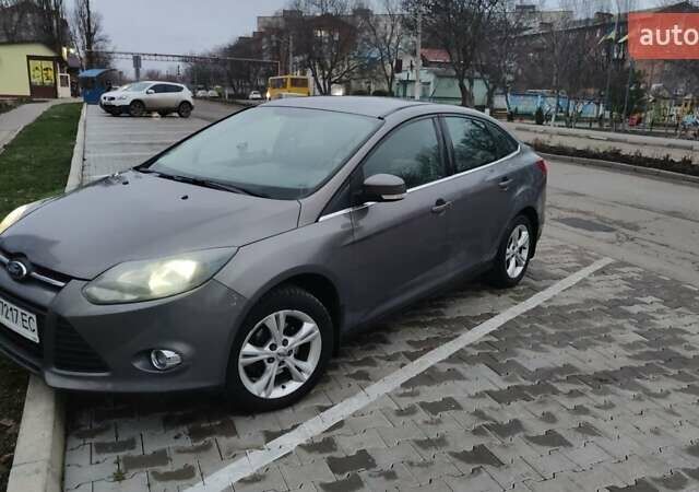 Серый Форд Фокус, объемом двигателя 1.6 л и пробегом 235 тыс. км за 7200 $, фото 1 на Automoto.ua