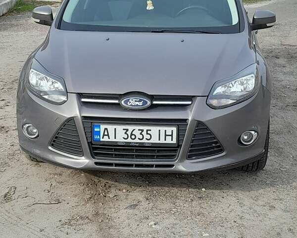 Серый Форд Фокус, объемом двигателя 1.6 л и пробегом 148 тыс. км за 7700 $, фото 1 на Automoto.ua