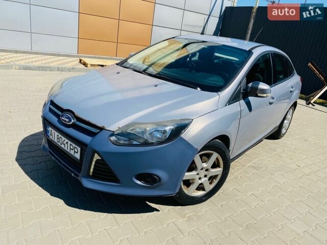 Сірий Форд Фокус, об'ємом двигуна 1 л та пробігом 212 тис. км за 4950 $, фото 1 на Automoto.ua