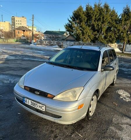 Серый Форд Фокус, объемом двигателя 1.8 л и пробегом 300 тыс. км за 2300 $, фото 1 на Automoto.ua