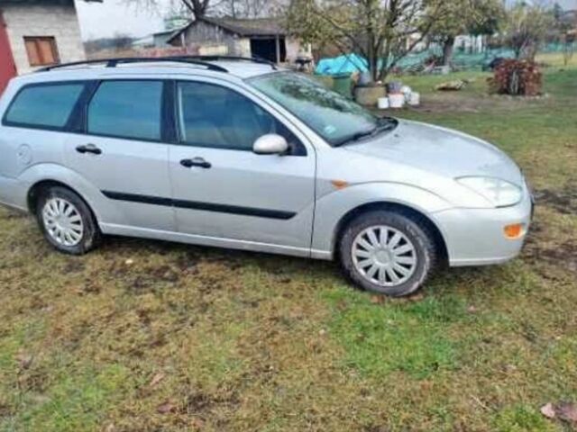 Серый Форд Фокус, объемом двигателя 1.8 л и пробегом 290 тыс. км за 1200 $, фото 1 на Automoto.ua