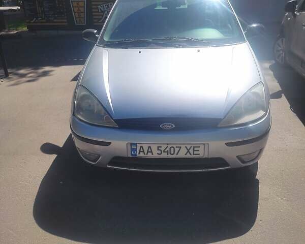 Серый Форд Фокус, объемом двигателя 1.8 л и пробегом 300 тыс. км за 3000 $, фото 1 на Automoto.ua