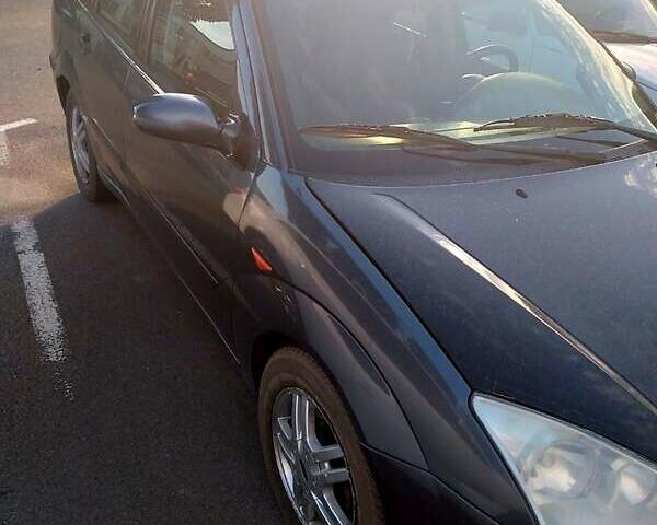 Серый Форд Фокус, объемом двигателя 1.8 л и пробегом 300 тыс. км за 3200 $, фото 1 на Automoto.ua