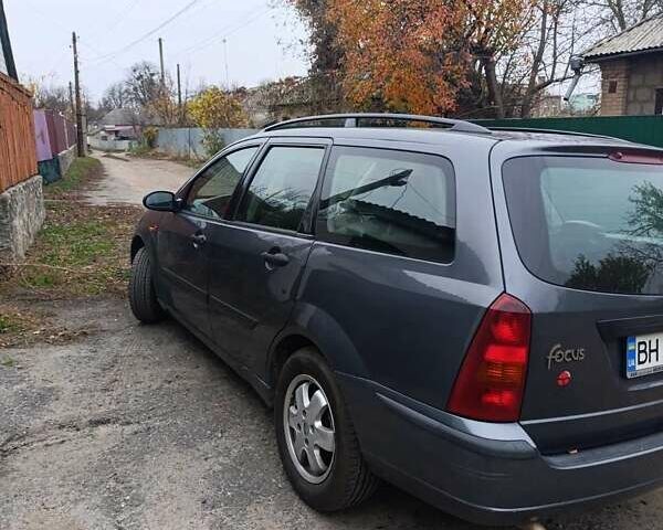 Серый Форд Фокус, объемом двигателя 1.8 л и пробегом 260 тыс. км за 3000 $, фото 1 на Automoto.ua