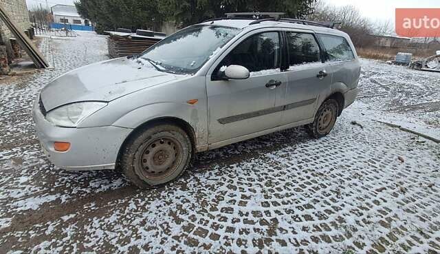 Серый Форд Фокус, объемом двигателя 1.8 л и пробегом 240 тыс. км за 1350 $, фото 1 на Automoto.ua