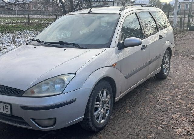 Серый Форд Фокус, объемом двигателя 1.6 л и пробегом 250 тыс. км за 3990 $, фото 1 на Automoto.ua