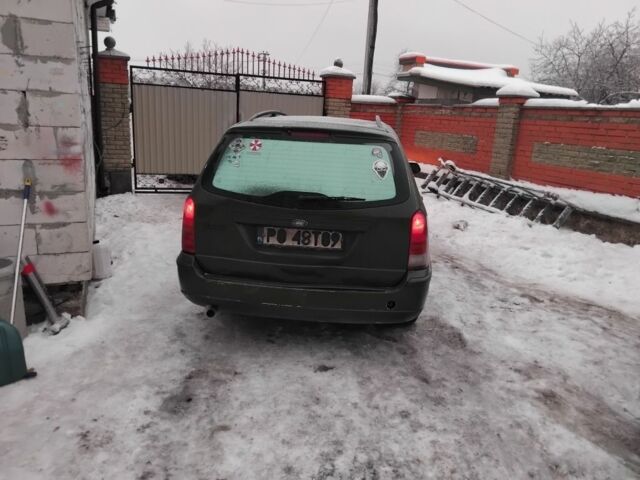 Серый Форд Фокус, объемом двигателя 1.6 л и пробегом 234 тыс. км за 1100 $, фото 1 на Automoto.ua