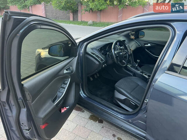 Серый Форд Фокус, объемом двигателя 1.56 л и пробегом 189 тыс. км за 7409 $, фото 1 на Automoto.ua