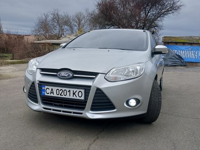 Сірий Форд Фокус, об'ємом двигуна 1.6 л та пробігом 233 тис. км за 6900 $, фото 1 на Automoto.ua