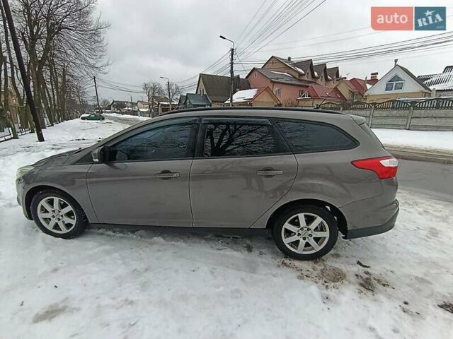 Сірий Форд Фокус, об'ємом двигуна 1 л та пробігом 228 тис. км за 5600 $, фото 1 на Automoto.ua