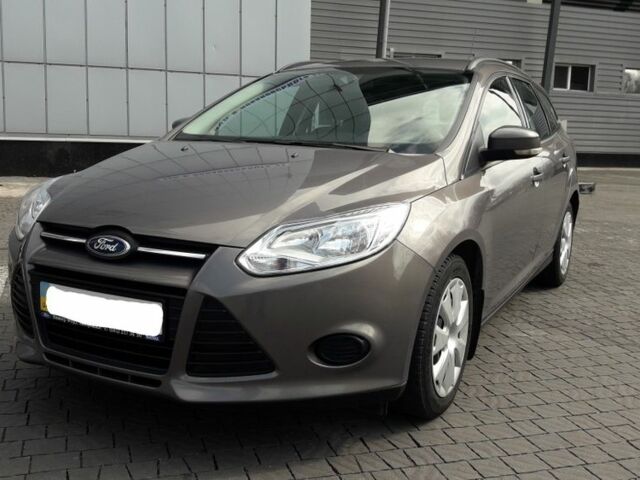 Сірий Форд Фокус, об'ємом двигуна 1 л та пробігом 230 тис. км за 11625 $, фото 1 на Automoto.ua