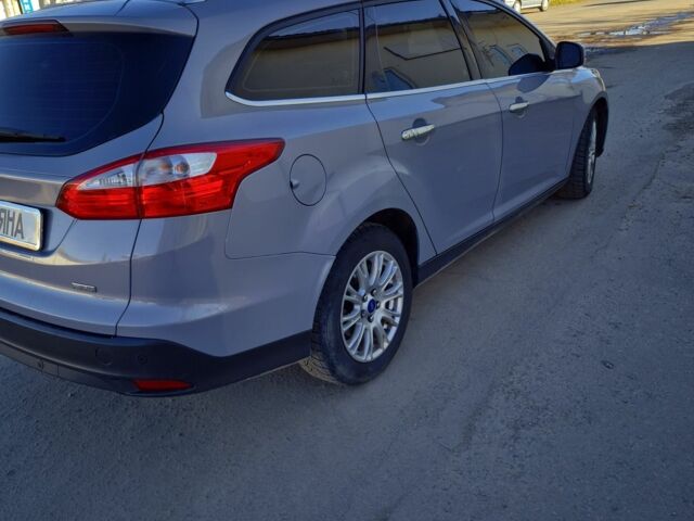Сірий Форд Фокус, об'ємом двигуна 1 л та пробігом 234 тис. км за 7999 $, фото 1 на Automoto.ua