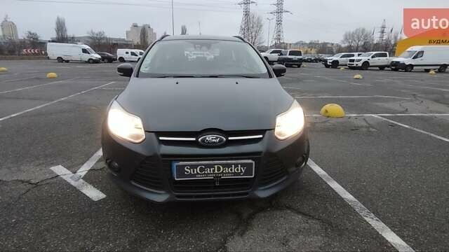 Сірий Форд Фокус, об'ємом двигуна 2 л та пробігом 212 тис. км за 7999 $, фото 1 на Automoto.ua