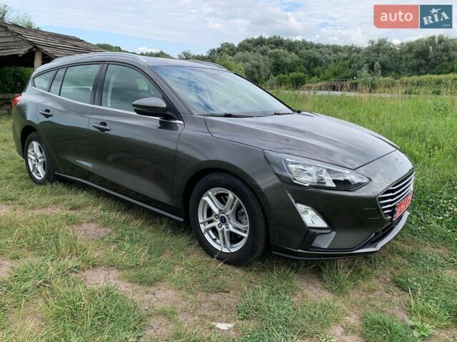 Сірий Форд Фокус, об'ємом двигуна 1.5 л та пробігом 194 тис. км за 11500 $, фото 1 на Automoto.ua