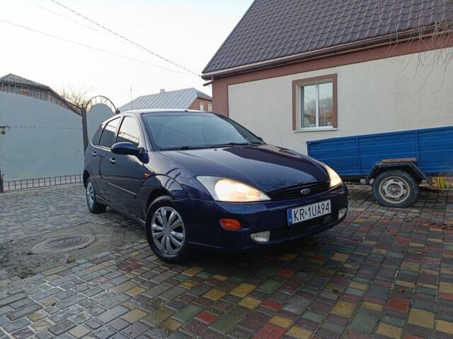Синий Форд Фокус, объемом двигателя 1.8 л и пробегом 250 тыс. км за 950 $, фото 1 на Automoto.ua