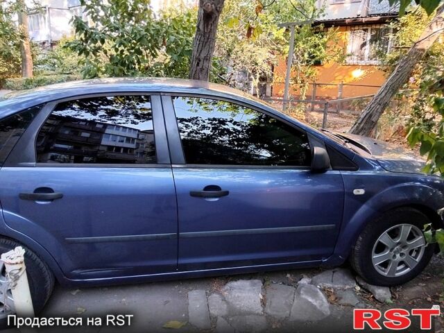 Синий Форд Фокус, объемом двигателя 1.4 л и пробегом 260 тыс. км за 4000 $, фото 1 на Automoto.ua
