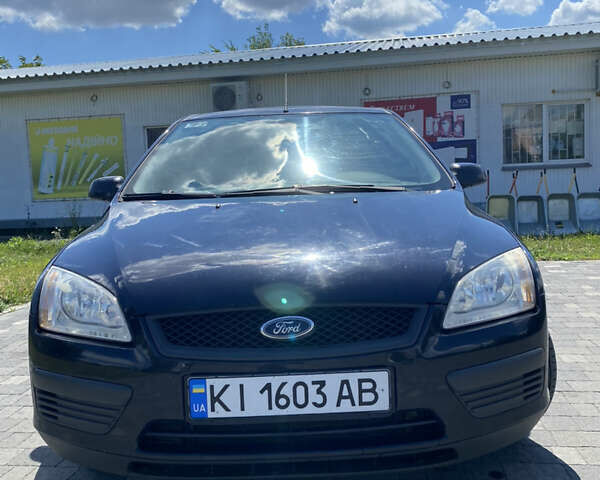 Синий Форд Фокус, объемом двигателя 1.4 л и пробегом 243 тыс. км за 4199 $, фото 1 на Automoto.ua