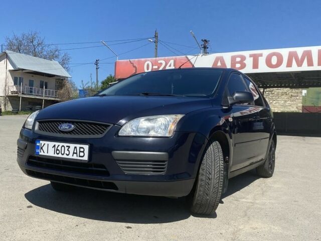 Синий Форд Фокус, объемом двигателя 1.4 л и пробегом 270 тыс. км за 3350 $, фото 1 на Automoto.ua