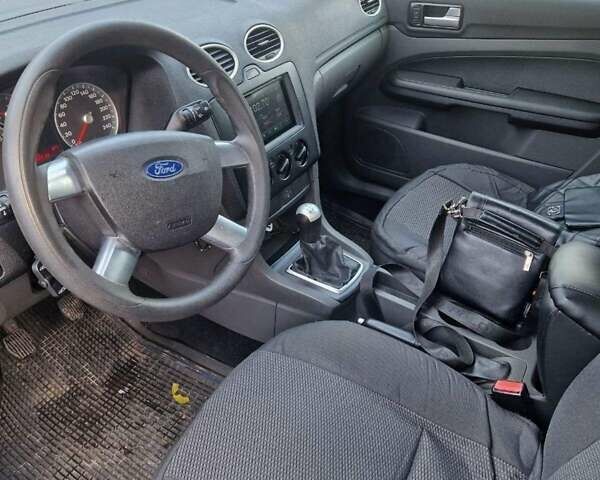 Синий Форд Фокус, объемом двигателя 1.6 л и пробегом 142 тыс. км за 4600 $, фото 1 на Automoto.ua