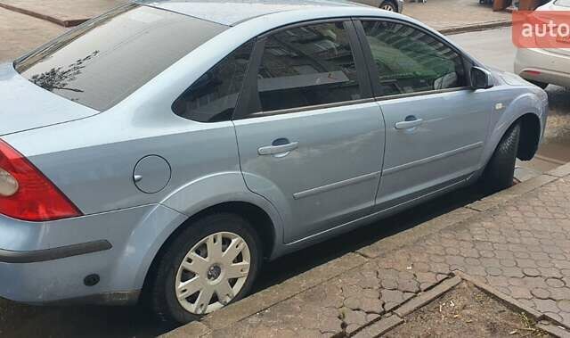 Синий Форд Фокус, объемом двигателя 1.6 л и пробегом 240 тыс. км за 5000 $, фото 1 на Automoto.ua