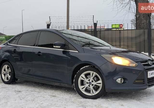 Синий Форд Фокус, объемом двигателя 1.6 л и пробегом 196 тыс. км за 5990 $, фото 1 на Automoto.ua